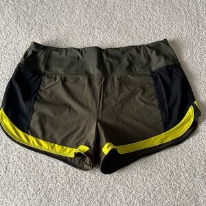 Athleta Olive Green running free short 3,5”with Yellow Trim